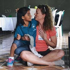 Woman from Shasta sitting with a girl.